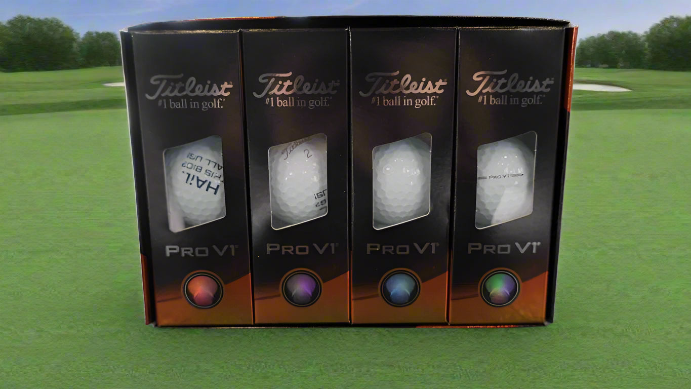 Four Titleist Pro V1 golf ball packages on a golf course background